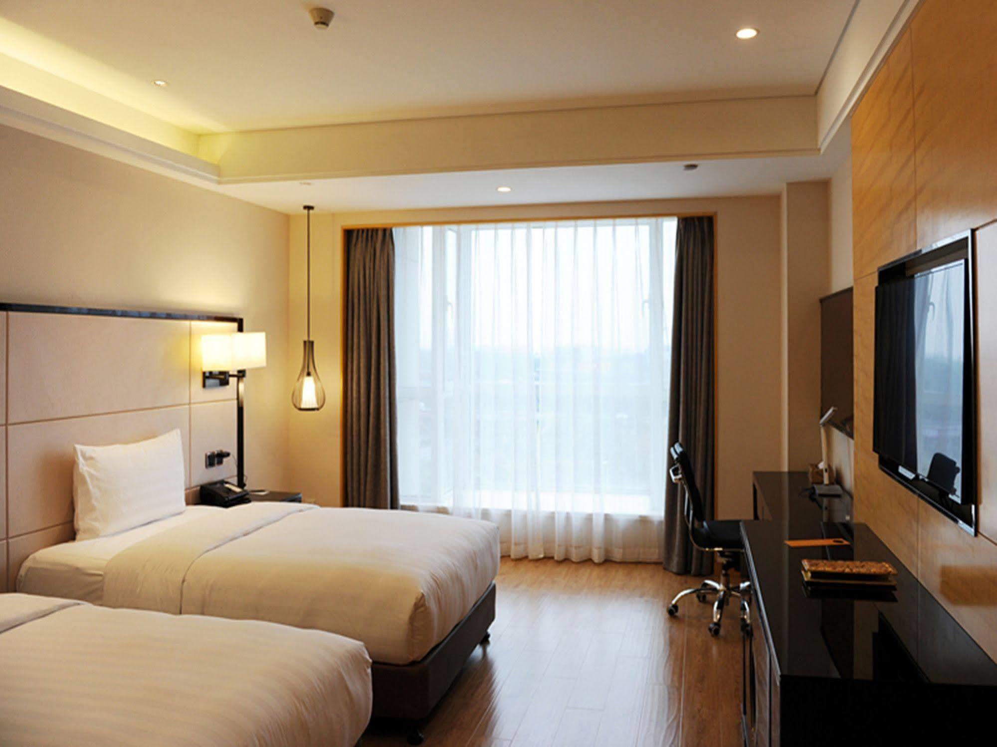 Hotel Pullman Qingdao Ziyue Exterior foto